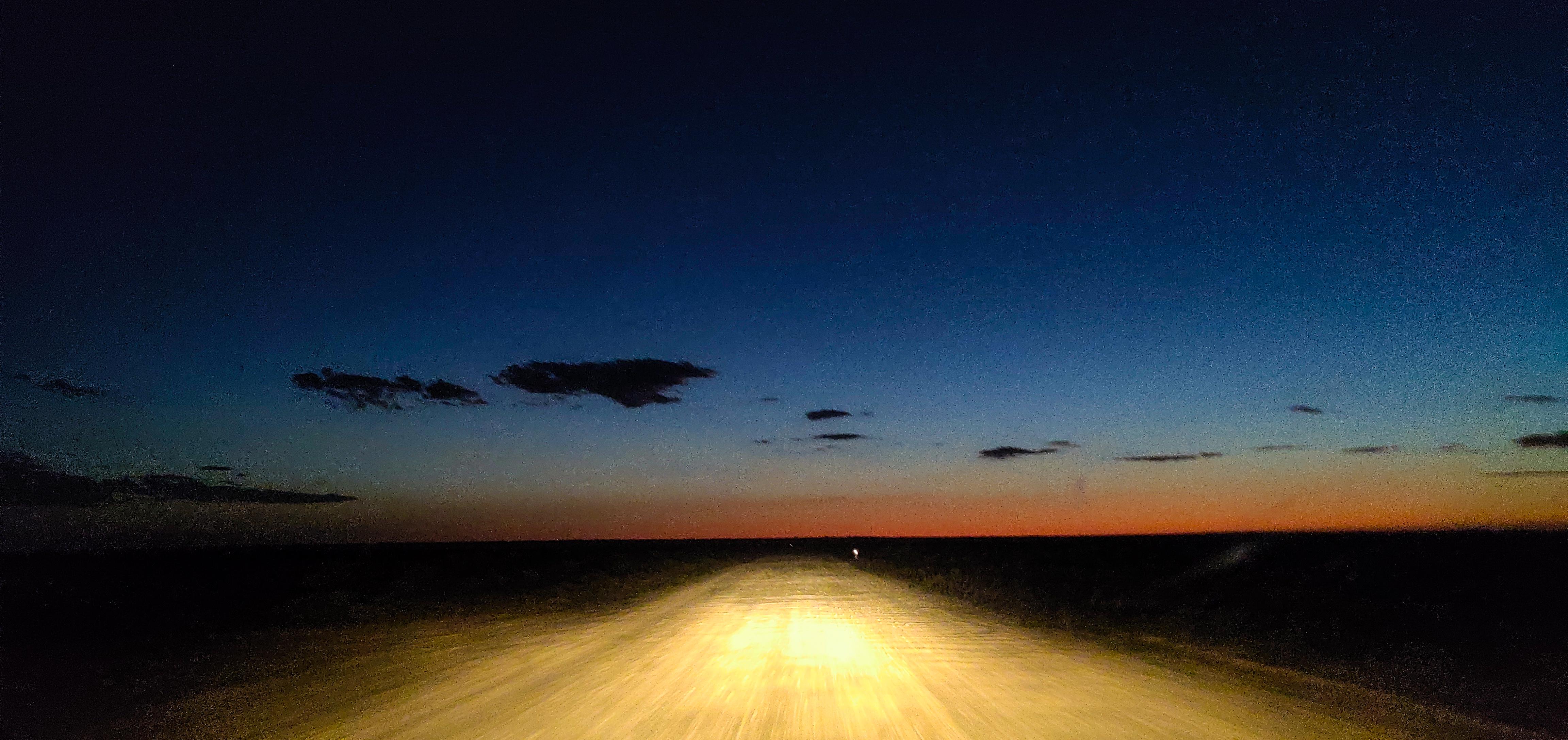 Driving at night on unsealed road to Mungo National Park