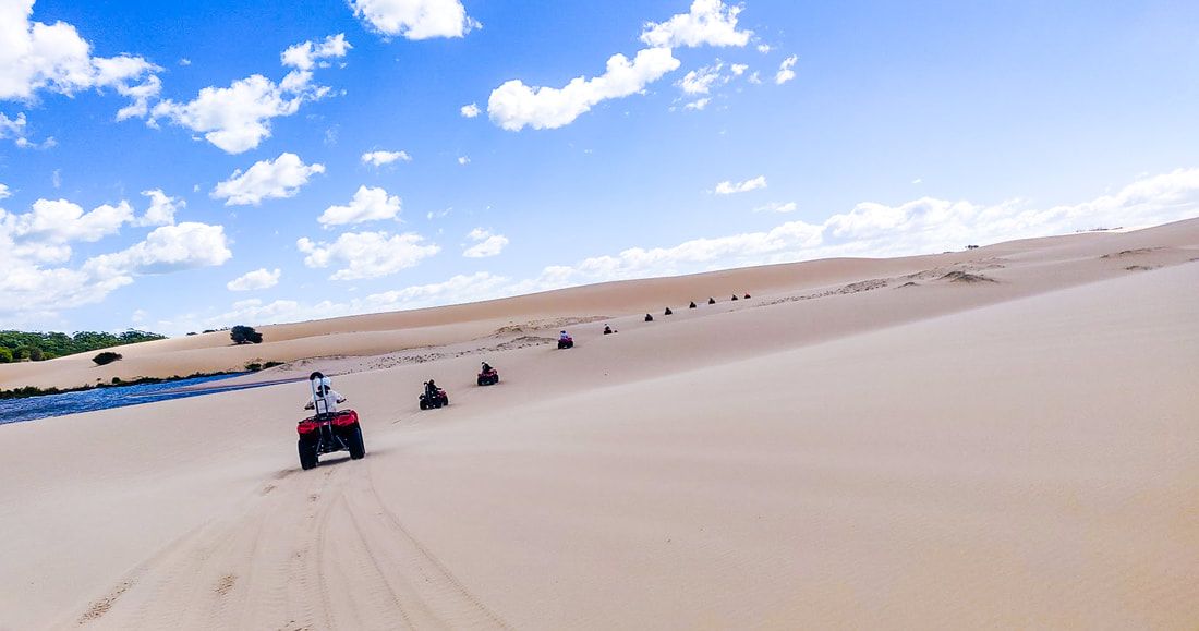 Quad​ Biking with Sand Dune Adventures